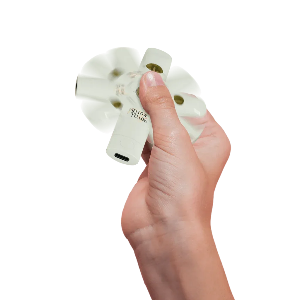 Close-up and lifestyle images of the MELLOW FELLOW ‘TERP SAUCE BLEND’ SPINNER DISPOSABLE by MELLOW FELLOW.
